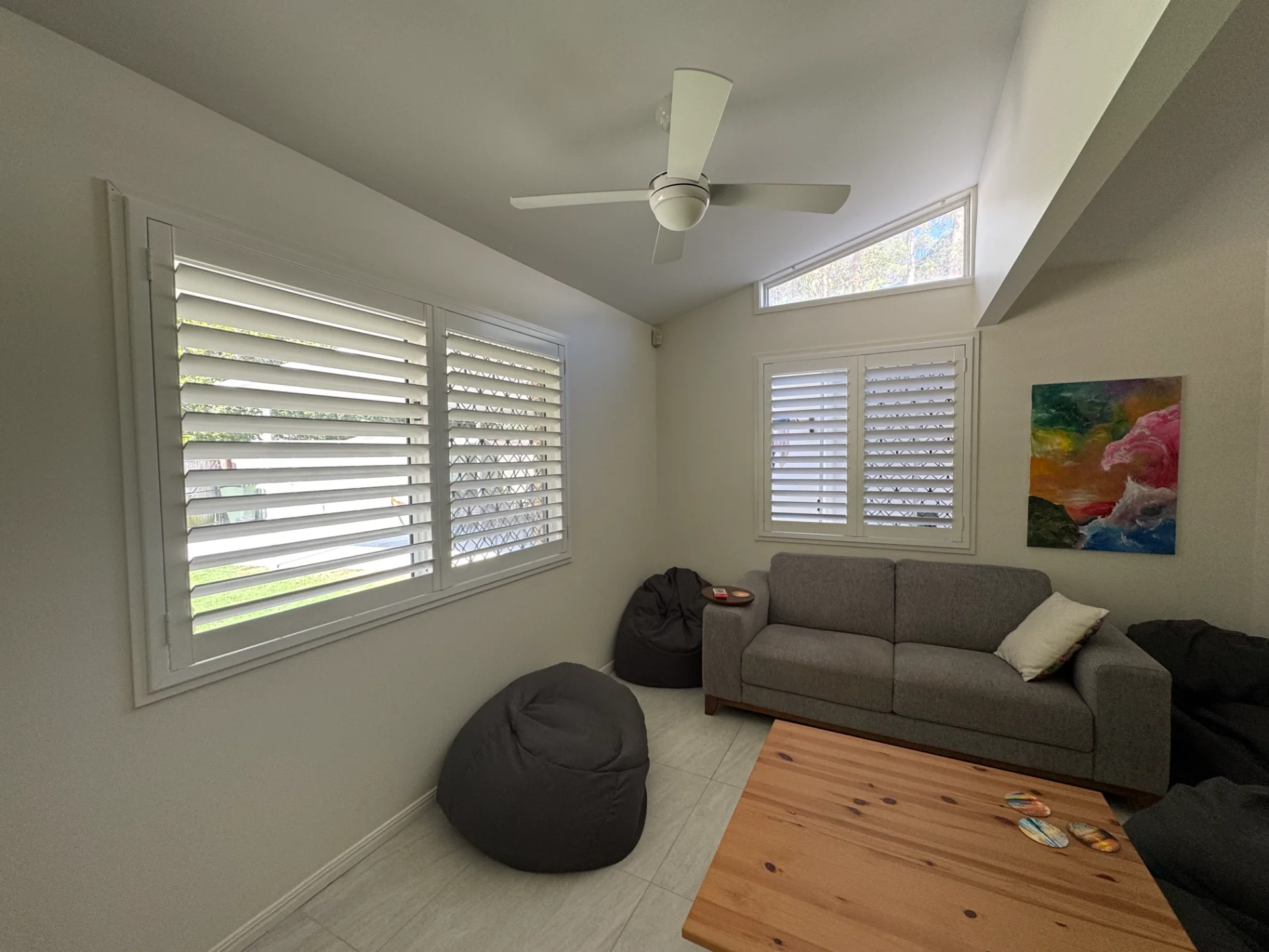 Hinged plantation shutters in a Southport living room