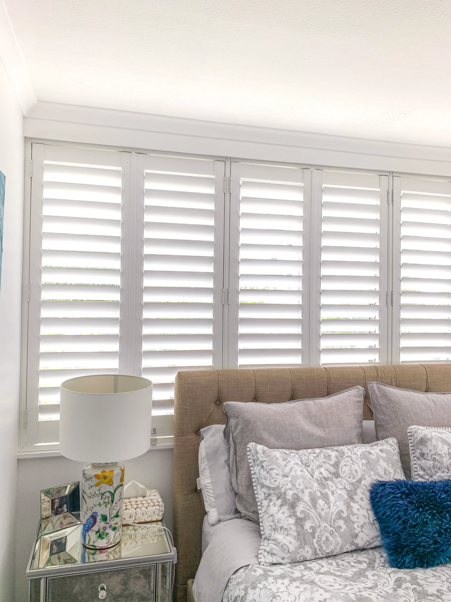 Hinged plantation shutters in a Surfers Paradise bedroom