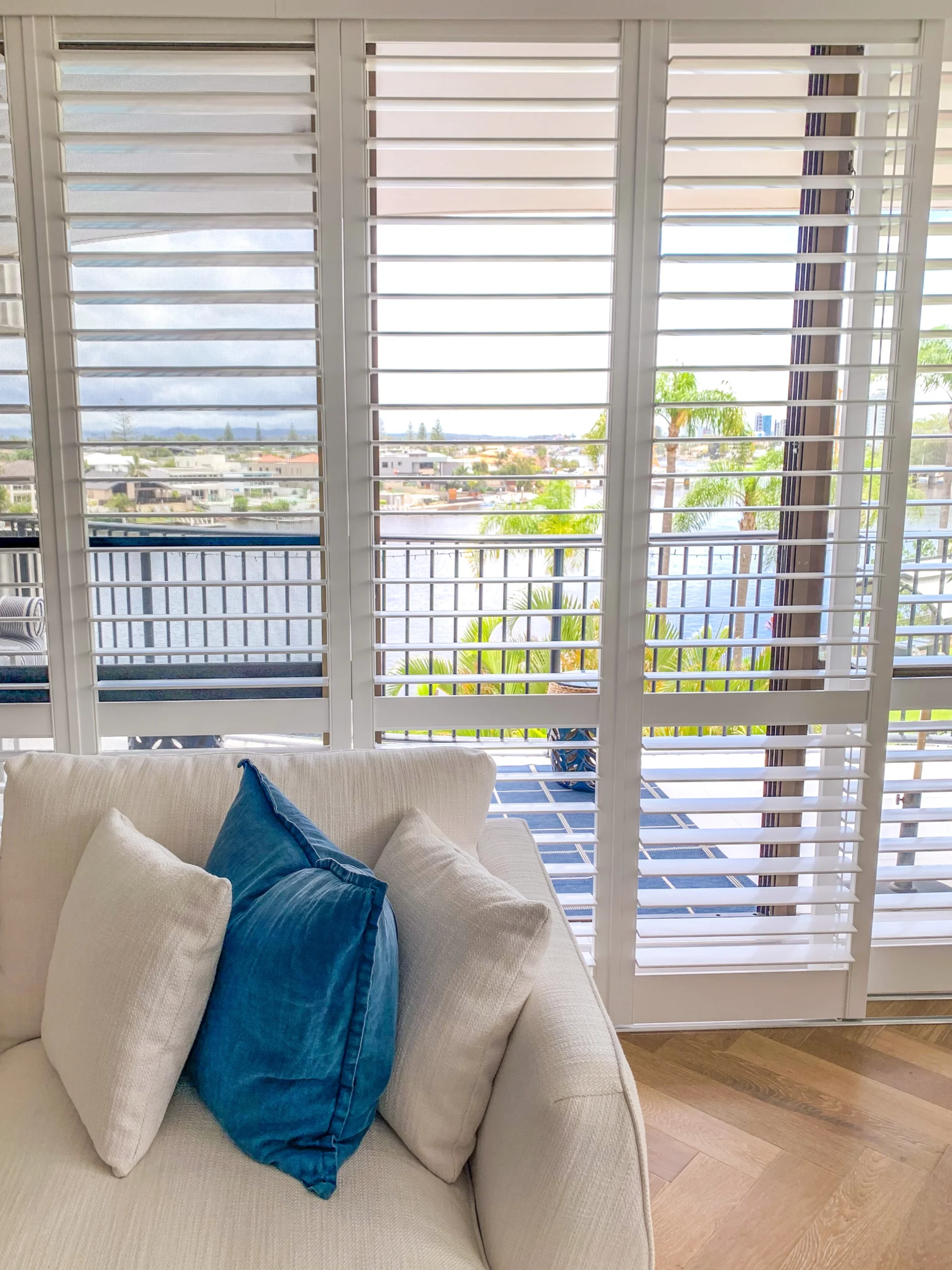Sliding plantation shutters in a Surfers Paradise living room